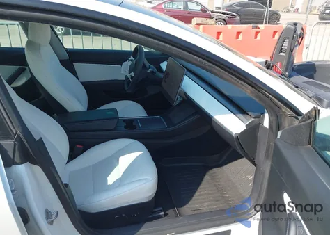 2021 Tesla Model 3 Standard Range Plus Rear-Wheel Drive from USA, damaged, VIN 5YJ3E1EA5MF851319